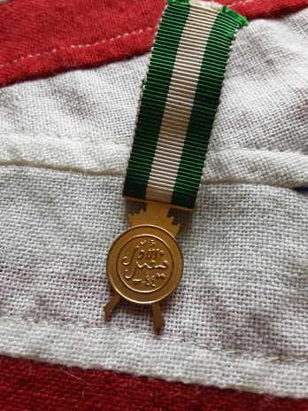 Period miniature Iraq Active Service Medal. King Faisal.