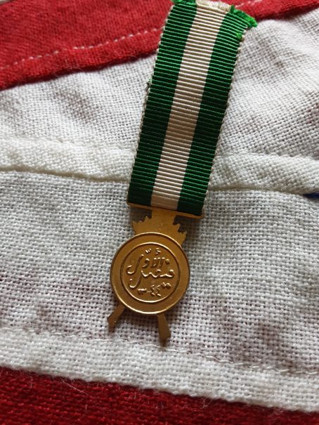 Period miniature Iraq Active Service Medal. King Faisal.