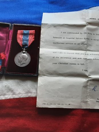 GV boxed ISM. Frederick William Thomas. Inland Revenue.