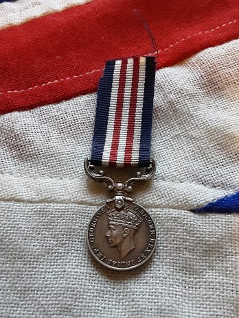 Period miniature WWII era Military Medal.