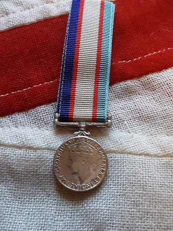 Period miniature WWII Australia Service Medal.