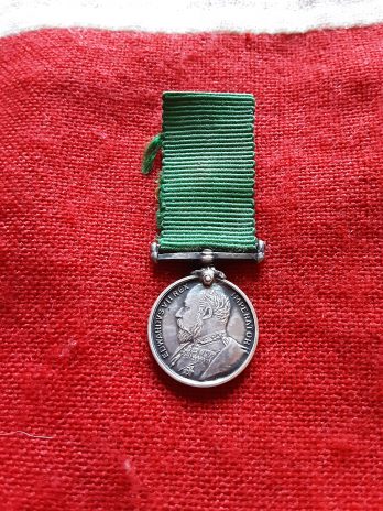 Period miniature EVII Volunteer Long Service Medal.