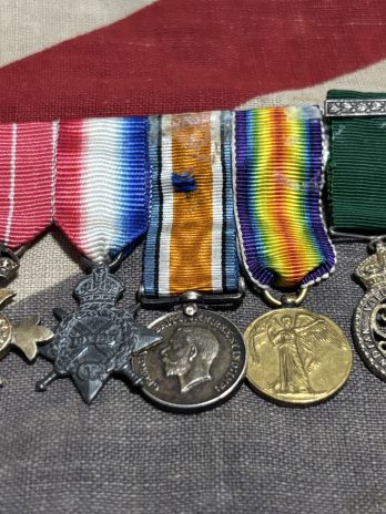 Miniature group of 5. OBE (military) 1915 Trio with Indian Volunteer Force Officers Decoration.