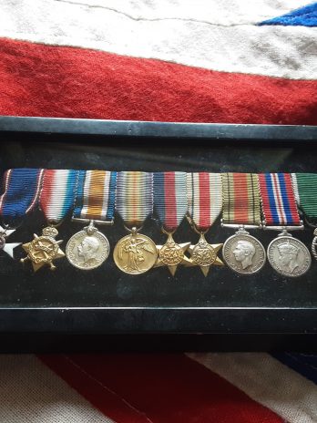 Period miniature MVO group of 9 miniatures. Royal Naval Reserve Officer