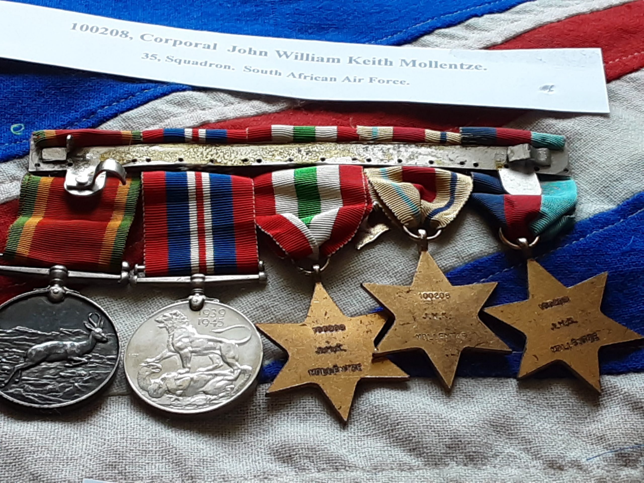 WWII South African Airforce group. Cpl John William Keith Mollentze. 35 Squadron. Born Queenstown. - Image 3