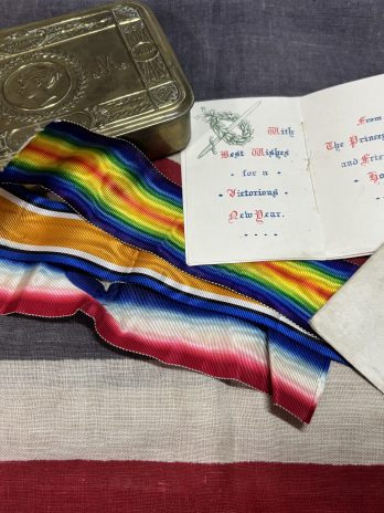 WWI Christmas tin with card and ribbons