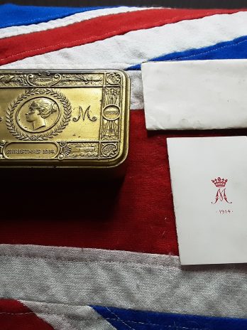 1914 Christmas tin with Xmas card.